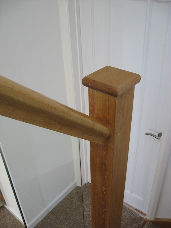 A clockwise single turn, three winder staircase in oak construction.