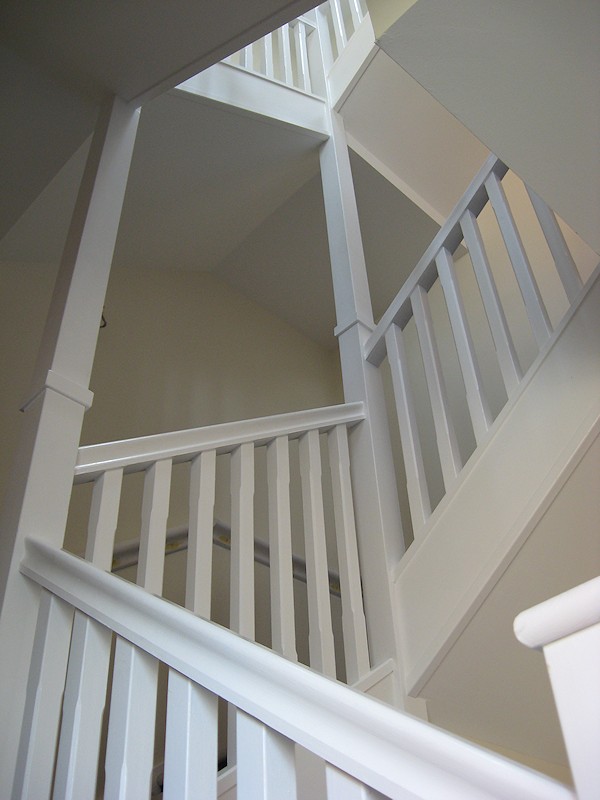 Two softwood painted stairs designed for high traffic usage.