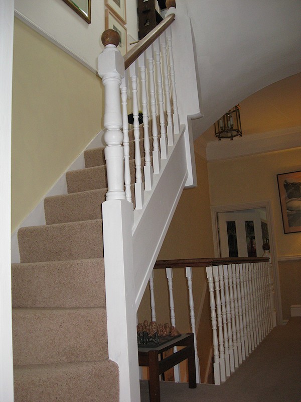 This softwood staircase for a loft conversion has a total of nine winders turning three times over 270 degrees.