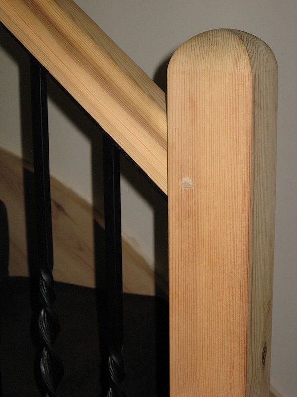 A softwood double turn winder staircase for a loft conversion