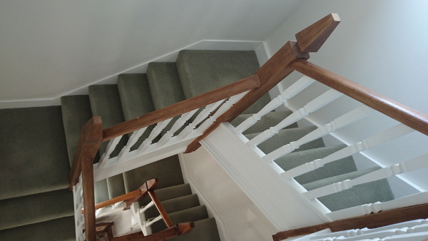 A very unique staircase, just look at those newel tops!