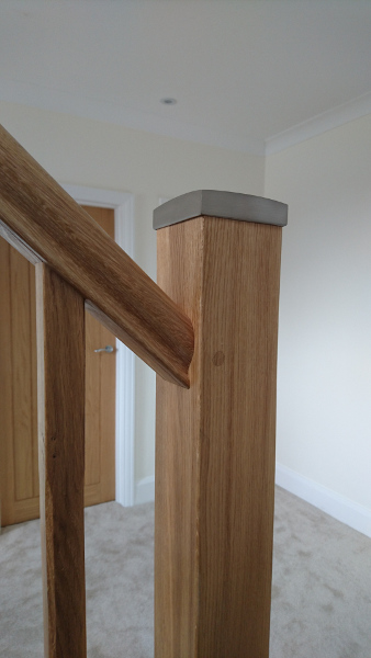 Oak winder staircase using our crown profile handrail.