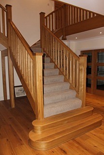 This staircase is all european oak construction with large 120mm stop chamfer newel posts and matching spindles.